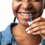 האם תופעות לוואי של גשר בשיניים יכול להוביל לבעיות חניכיים?